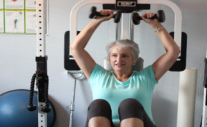 senior citizen lifting weights