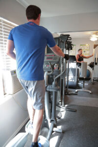 man using elliptical